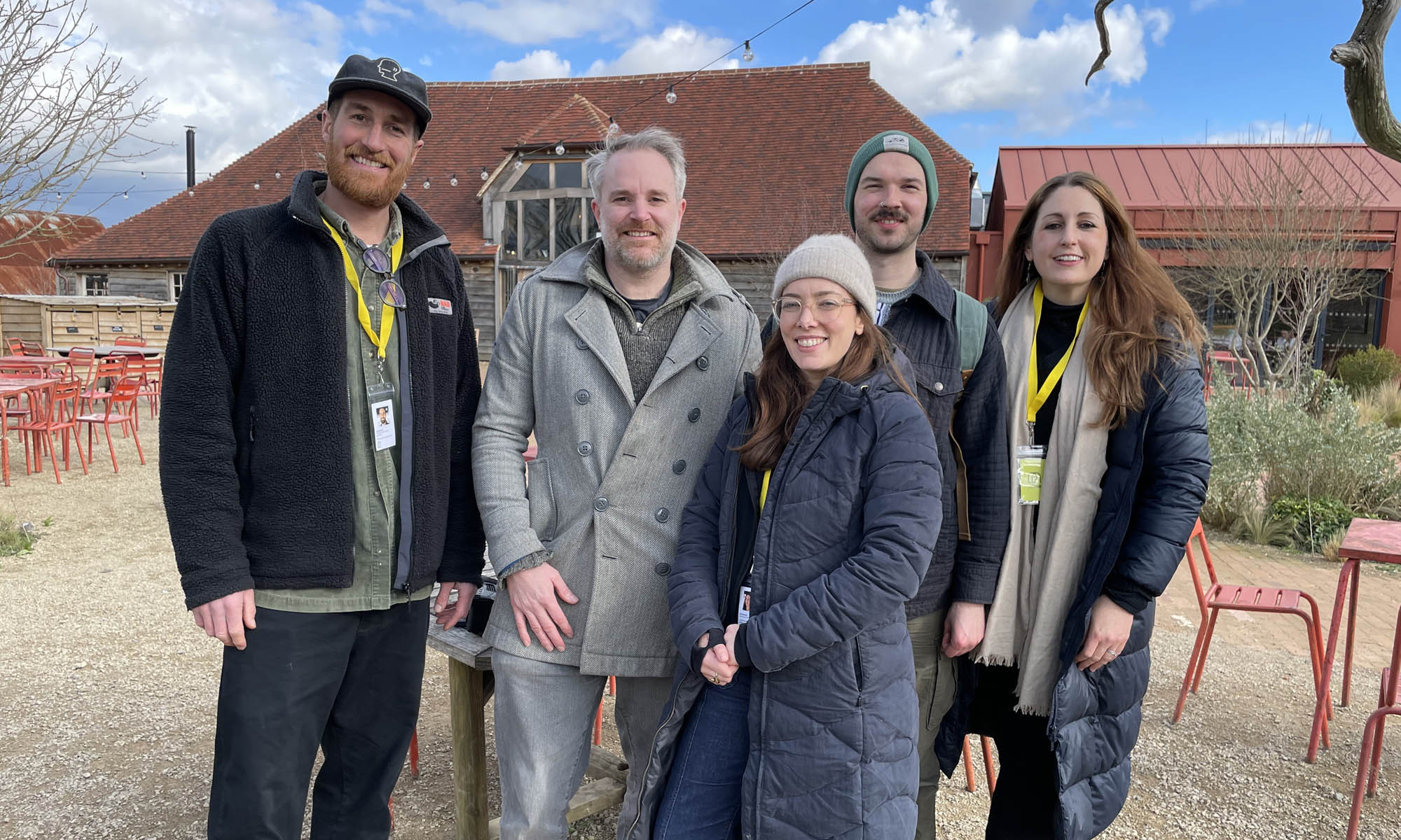Three members of the Mima team and 2 team members from REWILDlife pose for a photo whilst on a site visit.