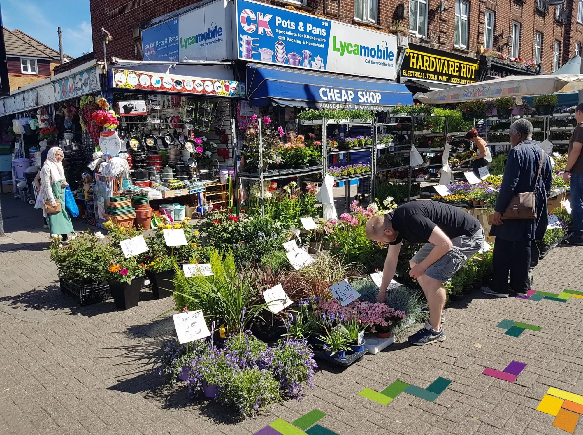 A close up of the look and feel of the paving, including a flower market