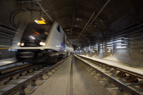 A crossrail train emerges out of a tunnel